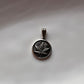 Sleek hemp round pendant crafted in sterling silver