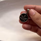 Stylish round hemp-inspired pendant in silver