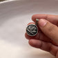 Modern hemp round pendant in polished sterling silver
