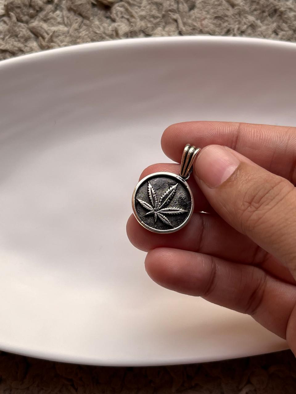 Modern hemp round pendant in polished sterling silver