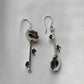 Handcrafted Silver Earrings Featuring Amethyst Stones and Floral Designs