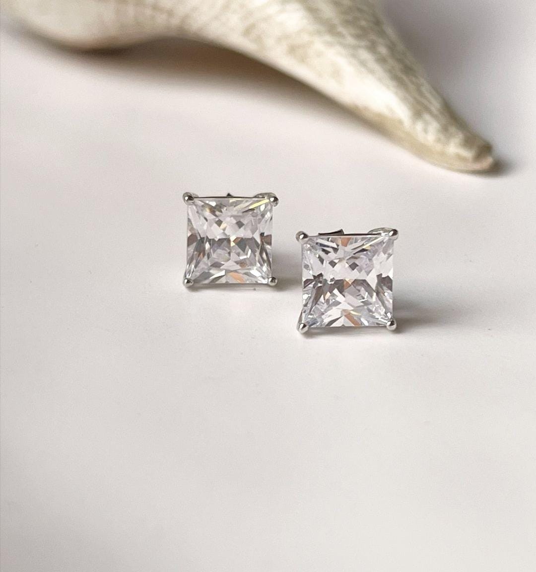 Elegant white CZ square cut silver statement earrings