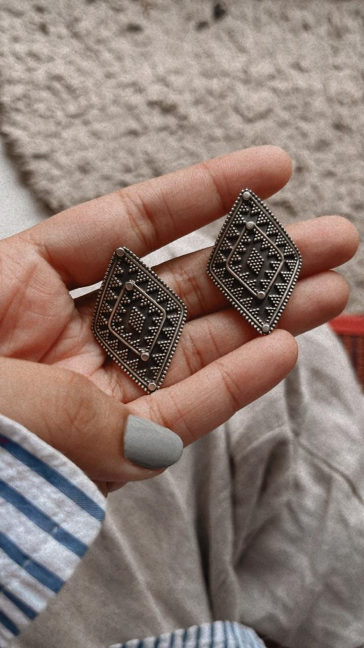 Charming tribal Rawa silver earrings with handcrafted detail