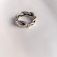 Handcrafted adjustable silver 925 ring with twisted braided pattern