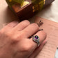 Stylish round amethyst ring with a bohemian silver design.
