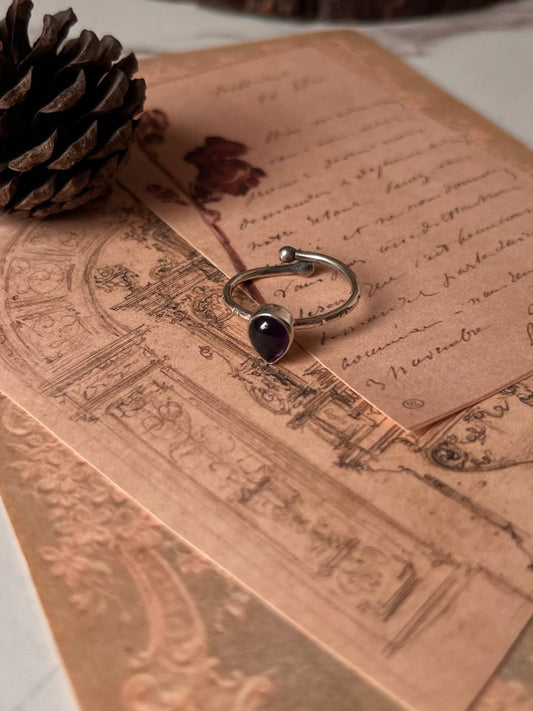 Tribal Engraved Silver Ring with Pear-Cut Amethyst and Adjustable Band