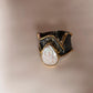 Rustic silver ring with a Baroque pearl for a timeless and natural look.