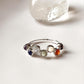 Timeless silver band ring with seven chakra stones for healing