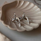 Pretty Bow CZ Silver Earrings for Statement Look