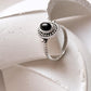 Black Onyx Rawa Tribal Silver Ring with intricate silver detailing on a white background. Perfect gift for Capricorn and Leo.