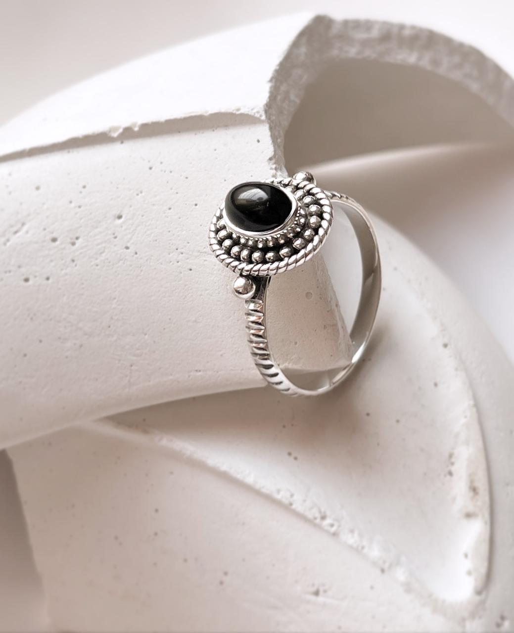 Black Onyx Rawa Tribal Silver Ring with intricate silver detailing on a white background. Perfect gift for Capricorn and Leo.