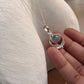 Elegant aquamarine silver pendant with a boho-inspired design.
