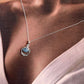 Handcrafted aquamarine boho silver pendant with intricate detailing.