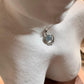 Boho-style silver pendant featuring a stunning aquamarine gemstone.