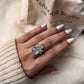 925 silver ring featuring a single aquamarine and blue topaz cluster
