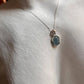 Large oval aquamarine gemstone set in sterling silver pendant