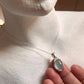 Large aquamarine oval pendant in 925 silver with calming blue hues