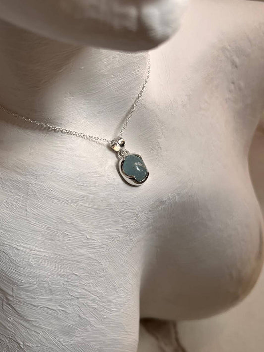 Close-up of Aquamarine Medium Oval Pendant in high-quality silver