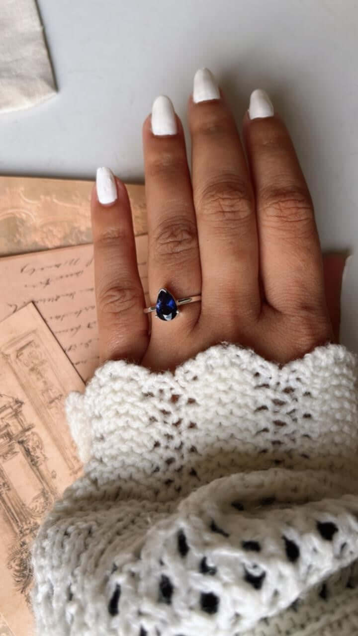 Iolite Pear Shaped Silver Ring with brilliant blue gemstone