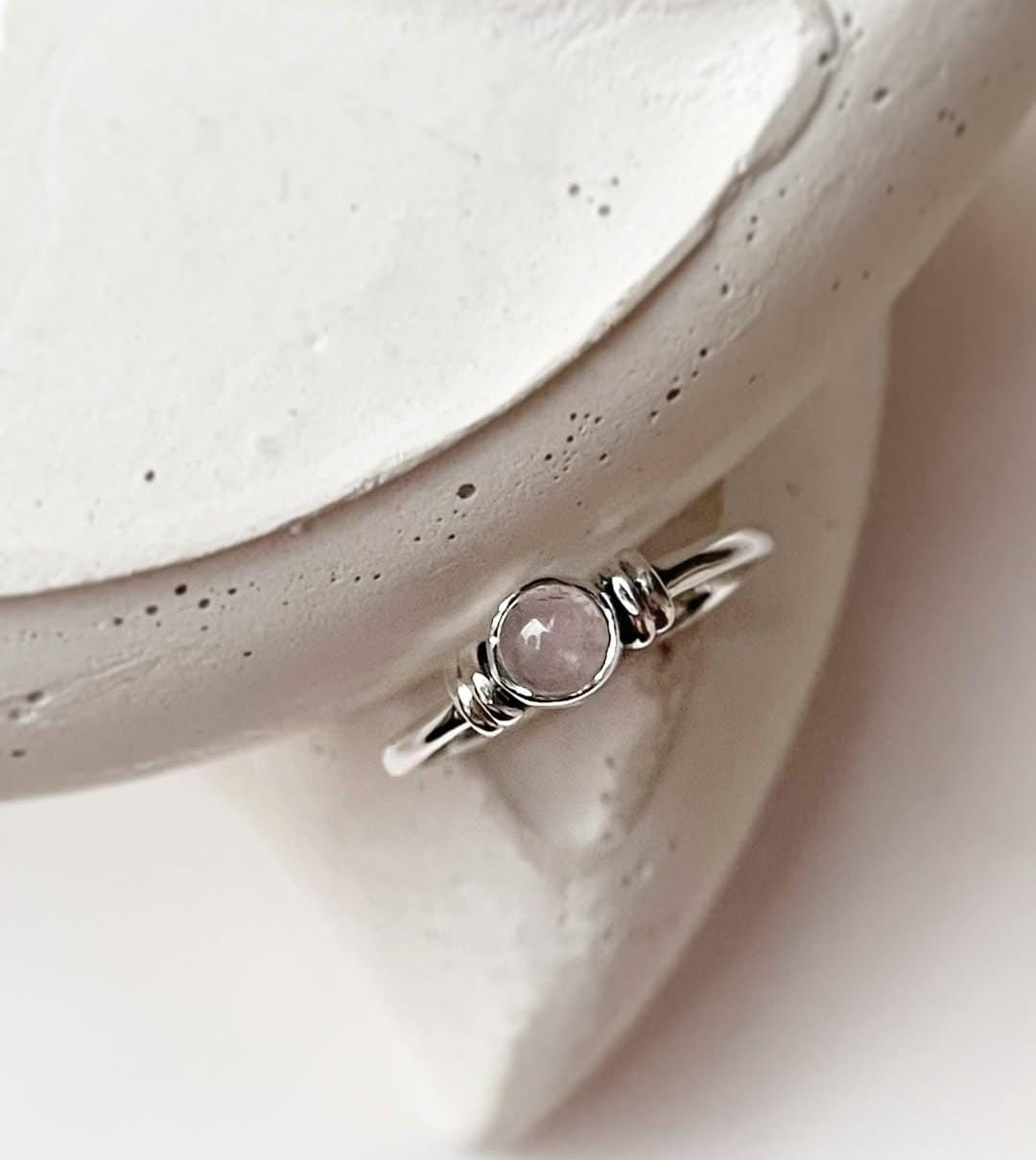 Minimalist plain band ring featuring rose quartz stone in silver