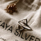 Close-up of duality silver ring with intricate, balanced details