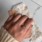 Elegant Gold Vermeil band ring with white topaz in Eclipse design