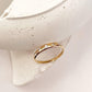 Gold Vermeil ring with white topaz and Eclipse band design