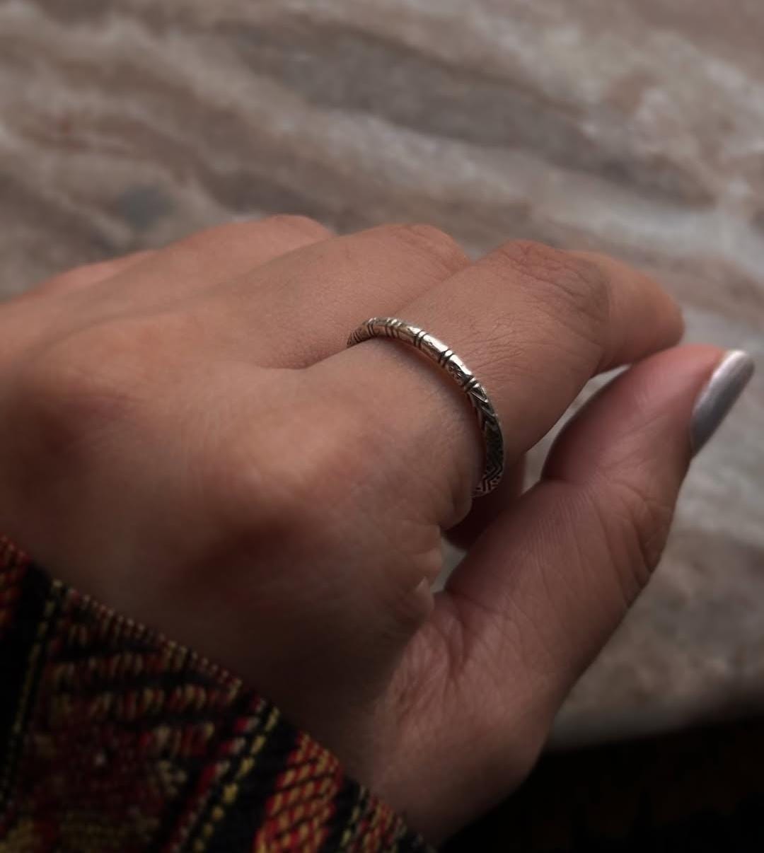 Close-up of Tribal Edge 925 Silver Ring worn on a hand, showcasing its unique design and fine craftsmanship.