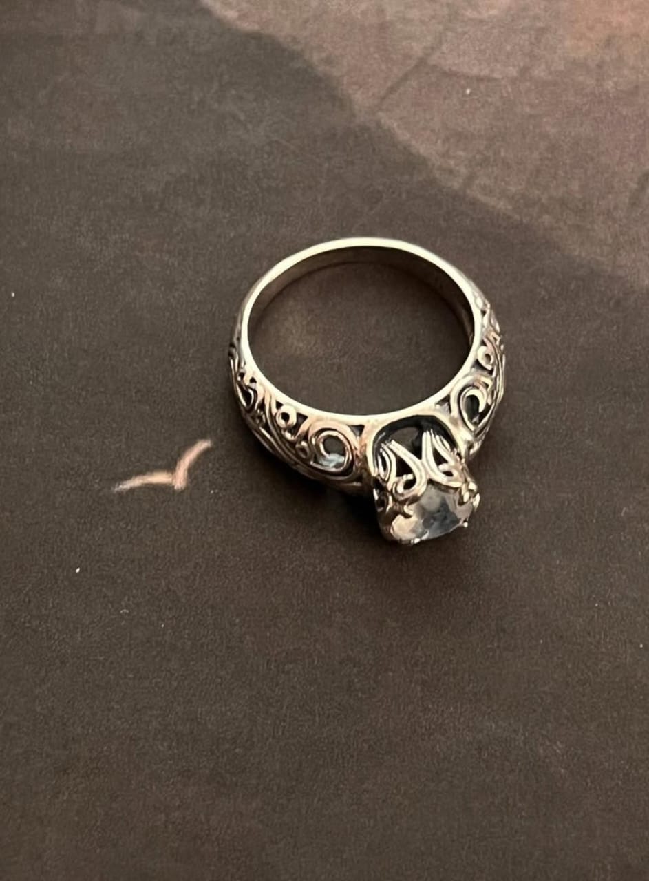 Solitaire moonstone ring with antique silver detailing