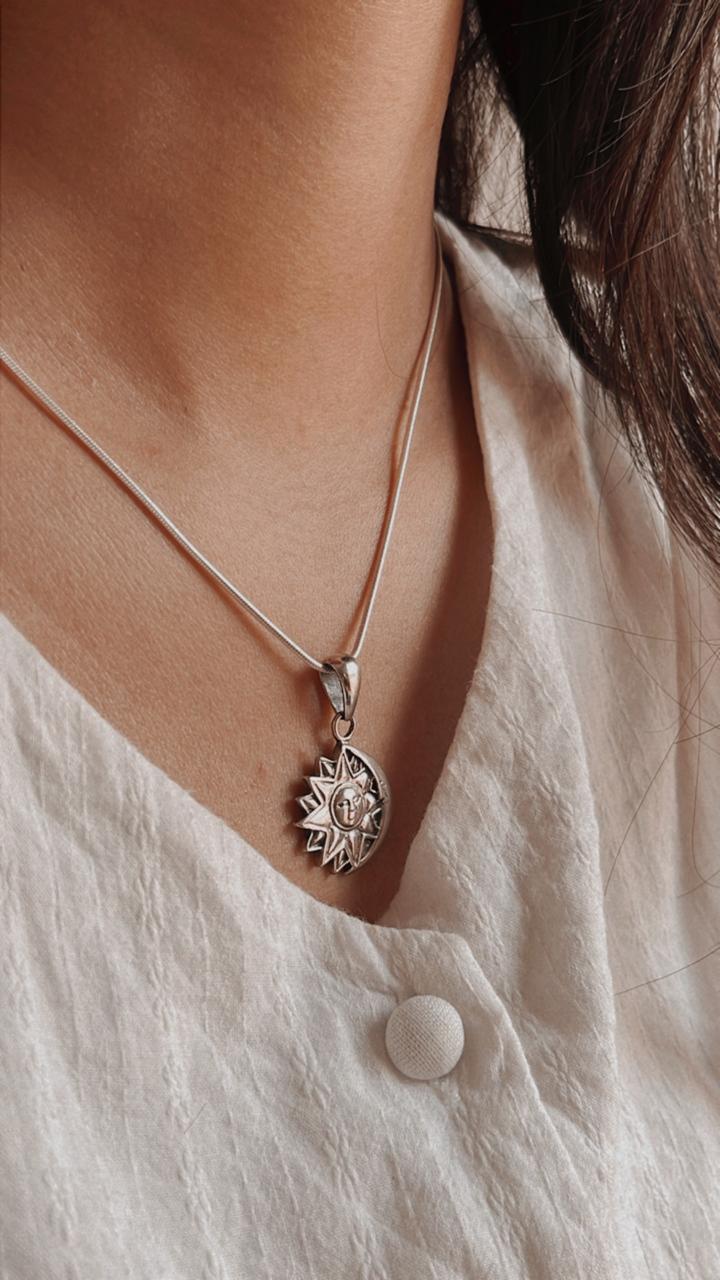 Yin Yang sun and moon symbol pendant in silver