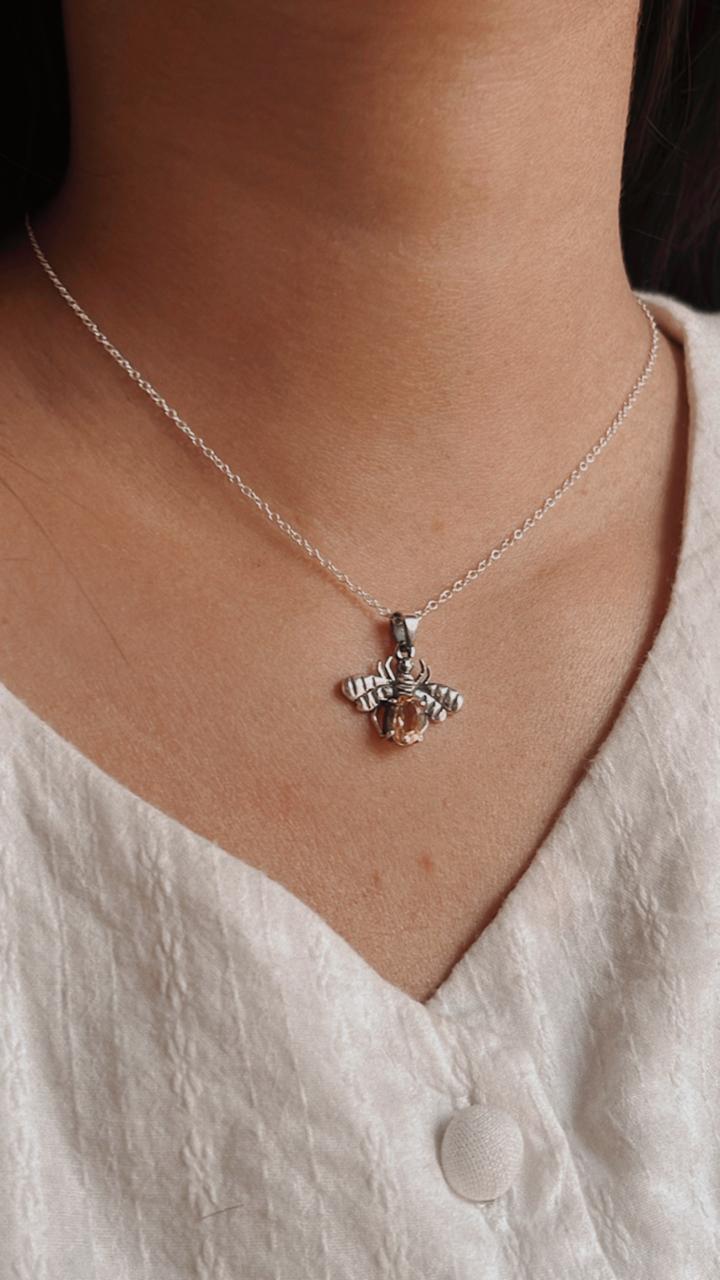 Handcrafted bee-shaped citrine pendant in sterling silver.