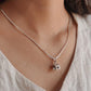Handcrafted dog house pendant in sterling silver with intricate patterns