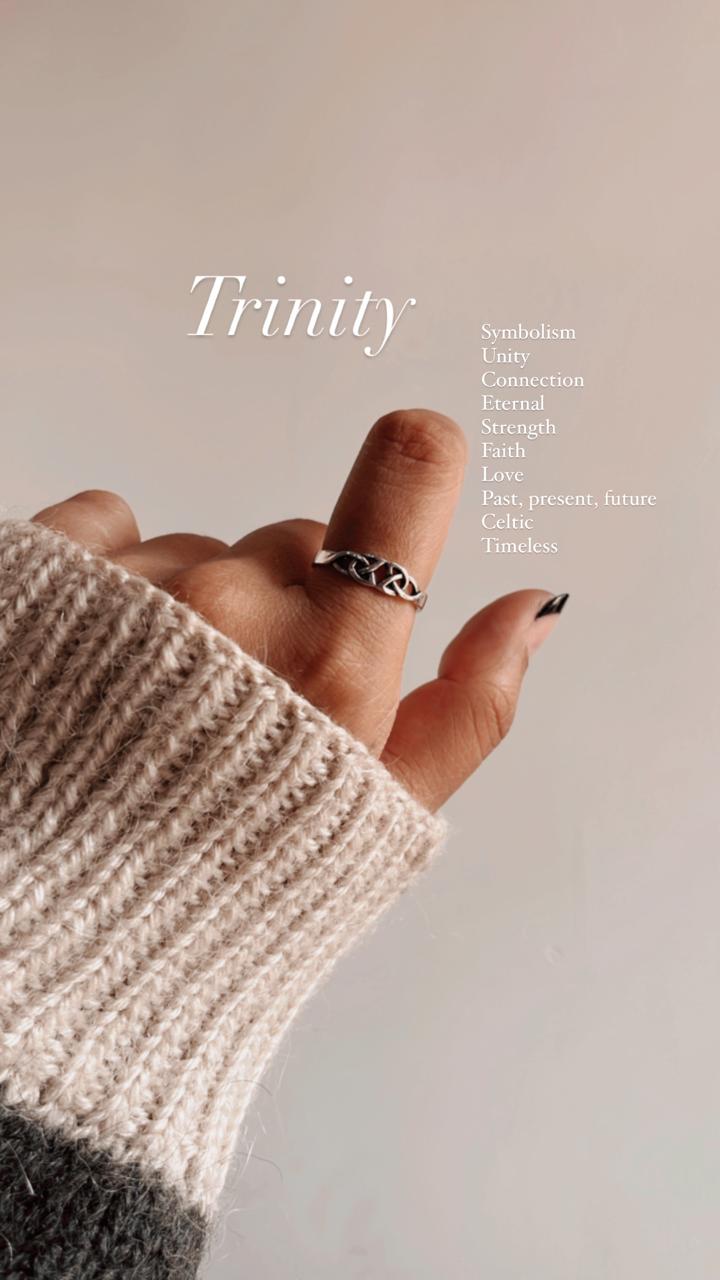 Sleek silver band with Celtic knot design