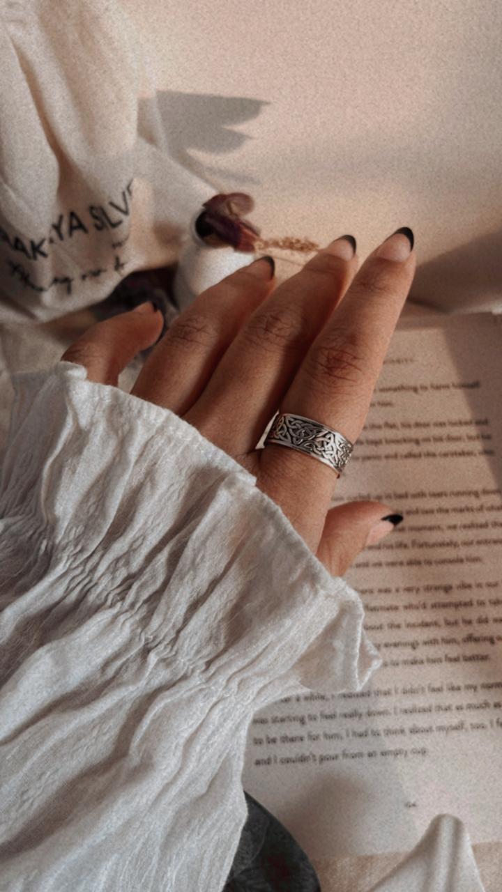 Handcrafted thick Celtic knot band ring in silver