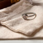 Timeless rose quartz silver ring with twisted rope band