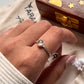 Vintage-inspired rose quartz rope band ring in sterling silver