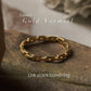 Gold vermeil thin link stack band ring showcasing luxury and durability.