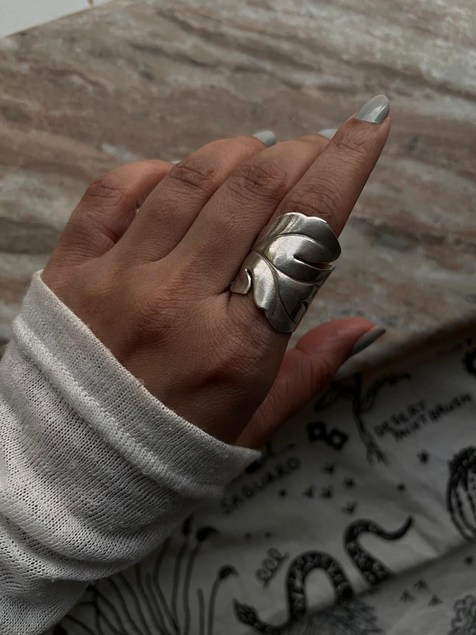 Sterling silver wrap ring featuring maple leaf design  