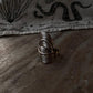 Handcrafted silver adjustable ring with leaf wrap design  