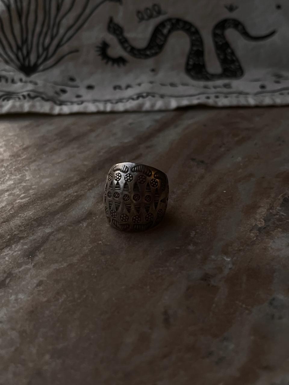 Artisan-made silver dome ring with tribal engravings