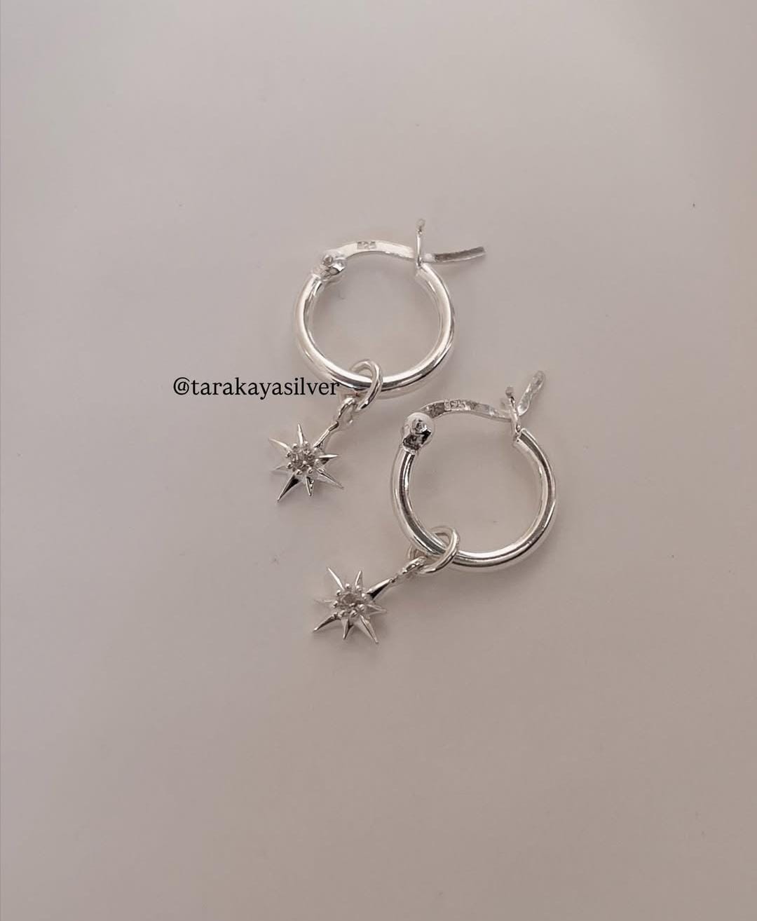 White Topaz North Star Charm on Plain Classic Hoop Earrings