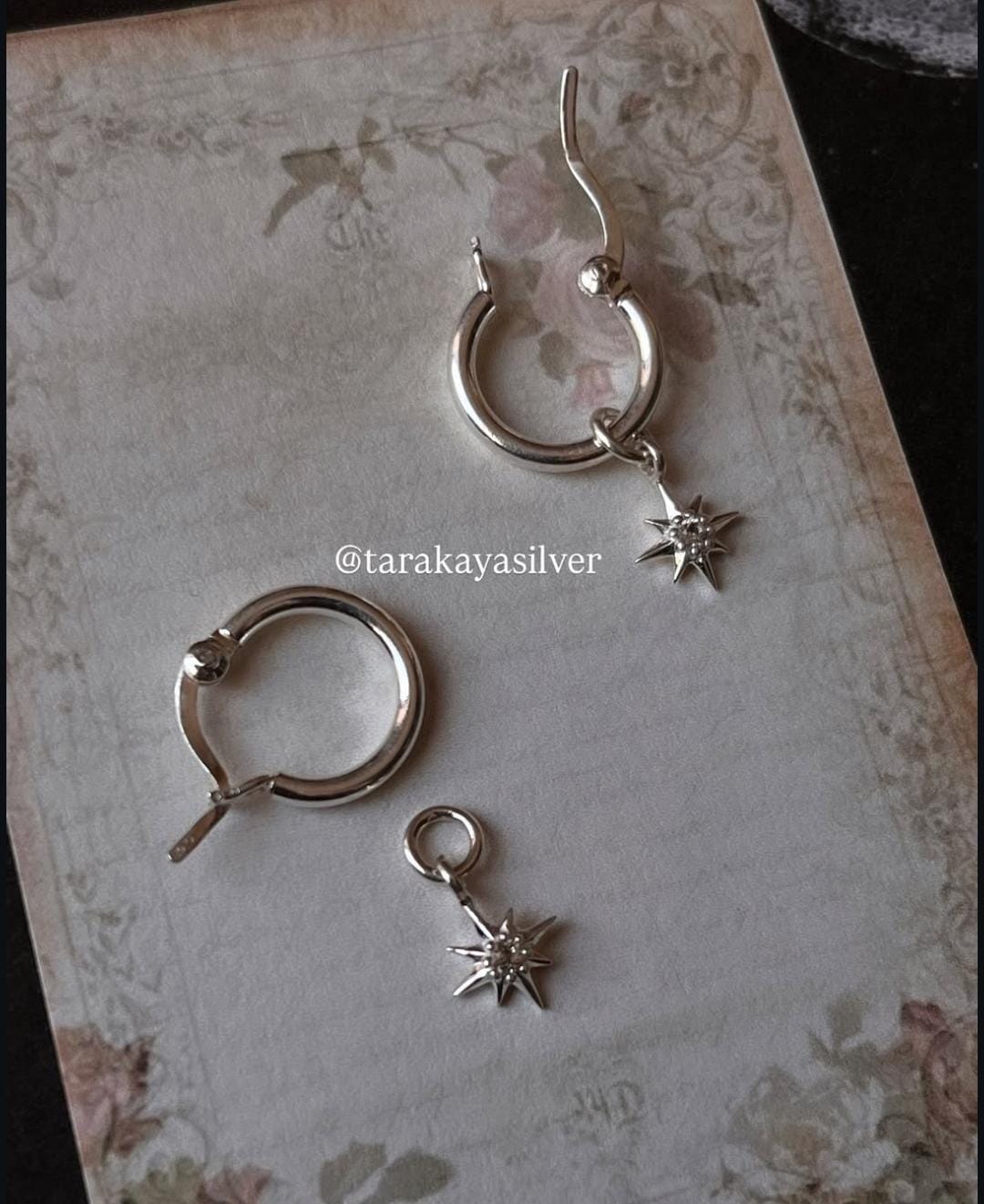 Stylish Classic Hoops with White Topaz and North Star Charm Detail