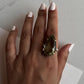 Sterling silver solitaire ring with vibrant green amethyst  