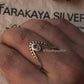 Handcrafted Vanki ring in 925 Sterling silver with Amethyst and Rawa detailing  