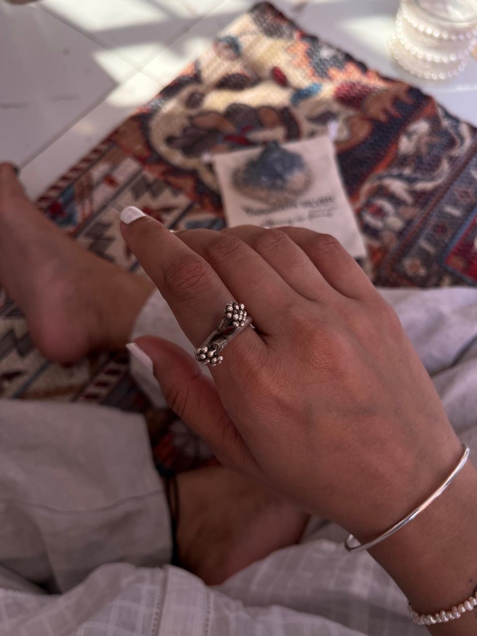 Artisan-made flower bunch adjustable ring in 925 silver  