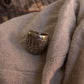 Adjustable silver ring with tribal dome detailing  