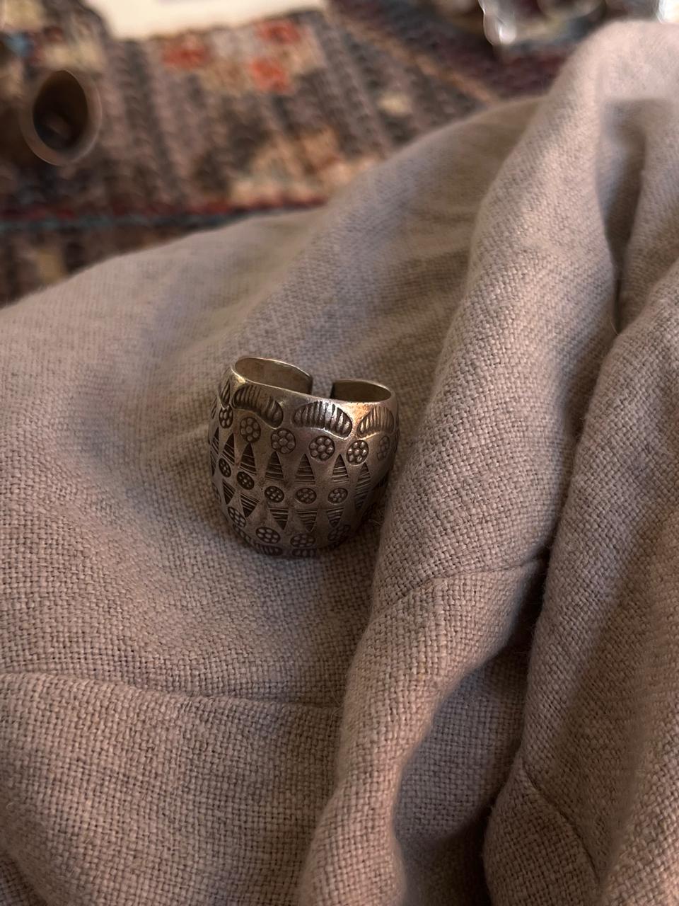 Adjustable silver ring with tribal dome detailing  