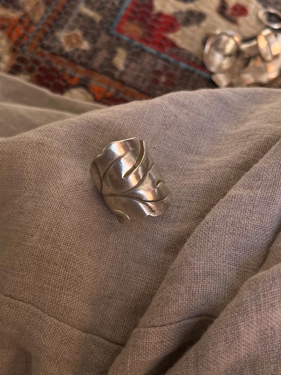 Handcrafted silver wrap ring with maple leaf design  