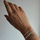 Handcrafted Basra pearl and cable dot silver bracelet collection  