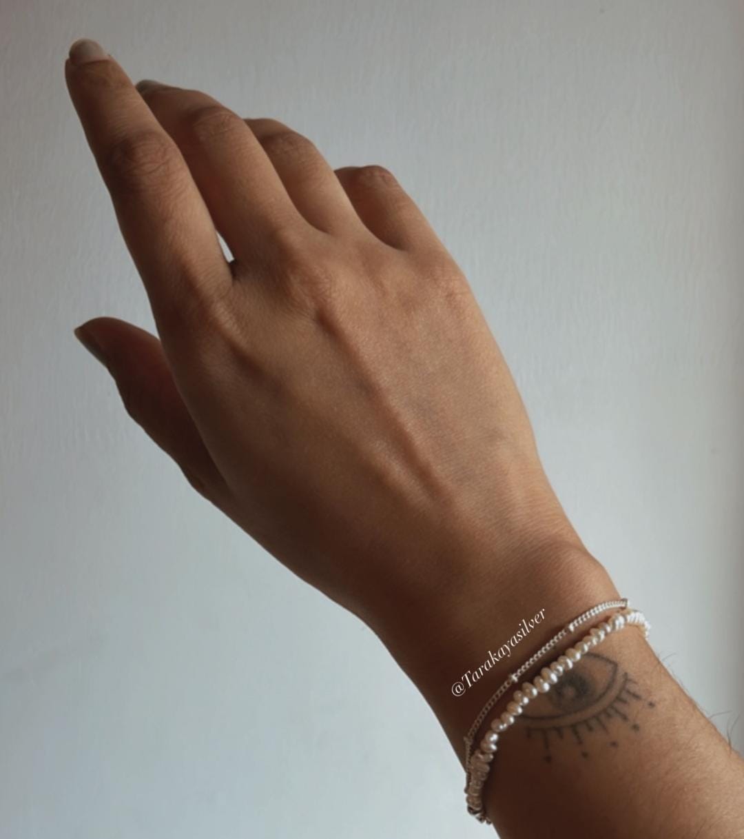 Handcrafted Basra pearl and cable dot silver bracelet collection  